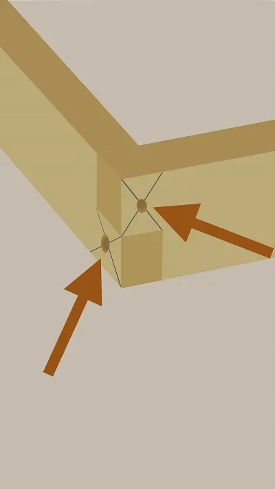 Assemblage d'un angle d'encadrement en bois